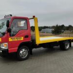 Chiński JAC 1063K jako pomoc drogowa. Pod kabiną Cummins